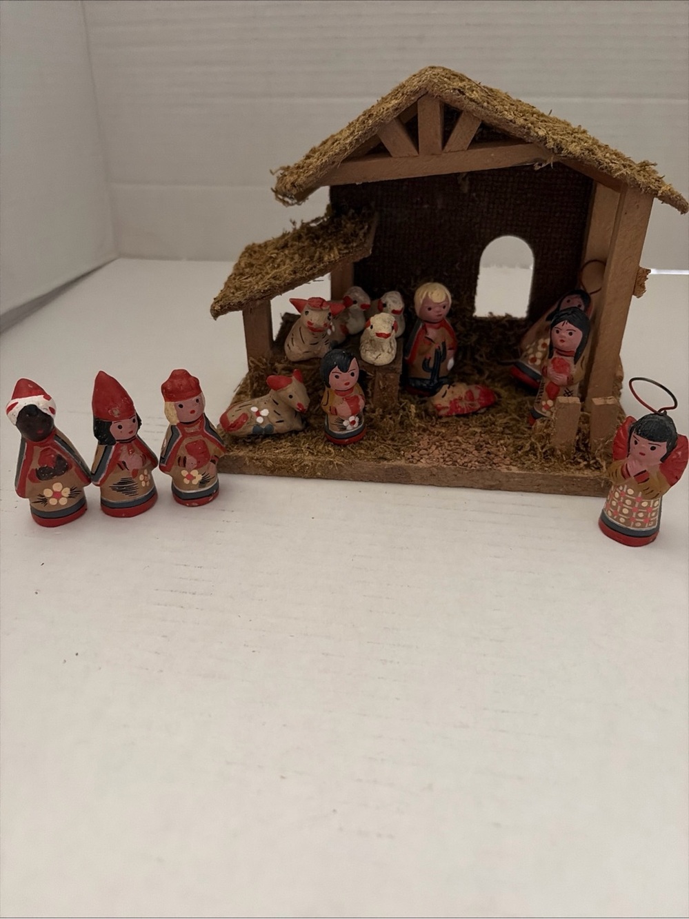 Hand-Painted Red and Cream Wooden Nativity Scene with Moss Roof